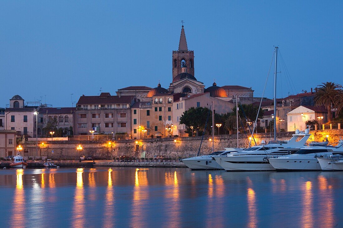 Italy, Sardinia, Western Sardinia, Alghero, city walls from the yacht marina, dawn