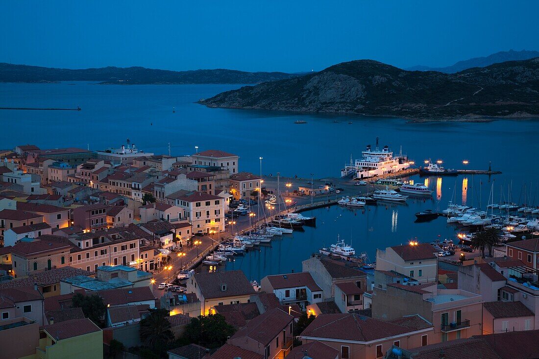 Italy, Sardinia, Northern Sardinia, Isola Maddalena, La Maddalena, aerial port view from the hills, evening