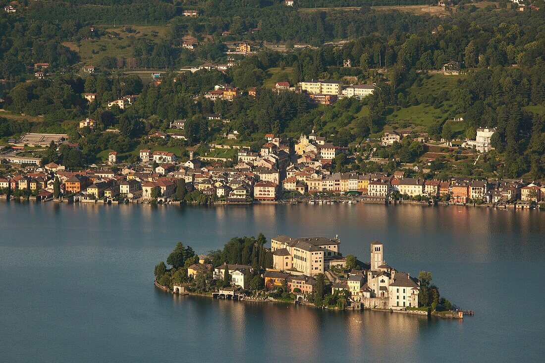 Italy, Piedmont, Lake Orta, Orta San Giulio, high angle view of town and Isola San Giulio from Madonna del Sasso sanctuary