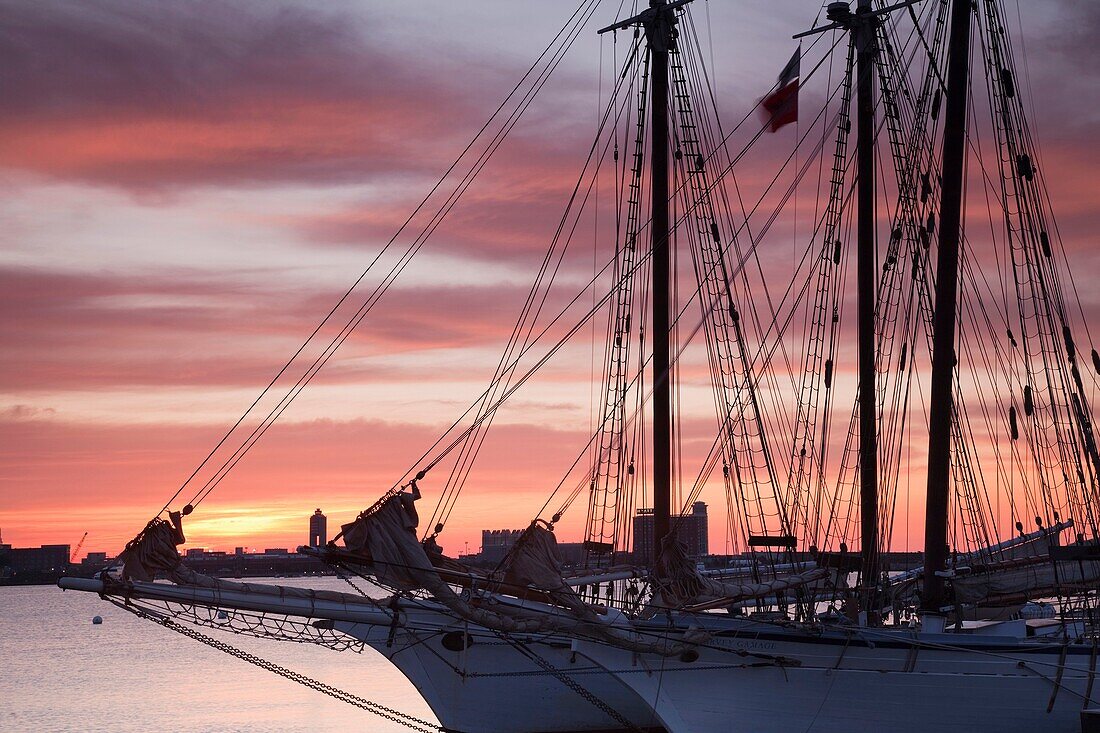 USA,Massachusetts, Boston, Sail Boston Tall Ships Festival, tall ship masts, sunrise