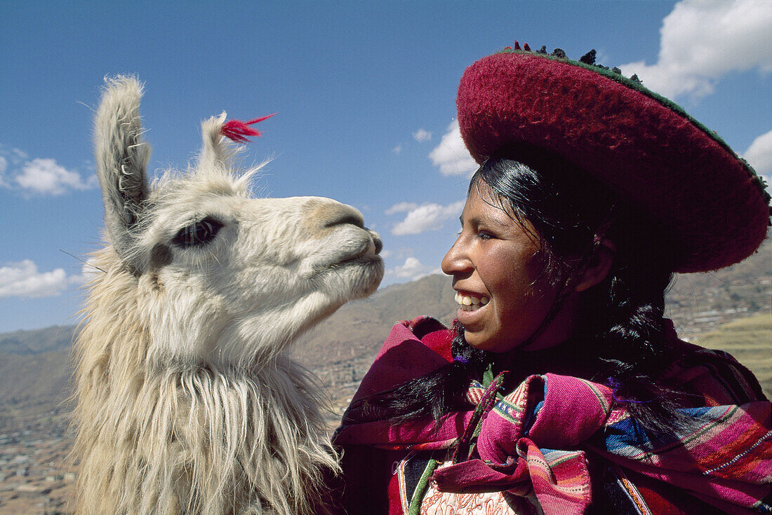 Woman and her llama, Cusco, Peru