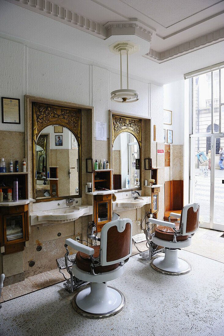 Sousa barber shop with original furniture dating from 1913 at Rua Sa da Bandeira, Porto. Portugal