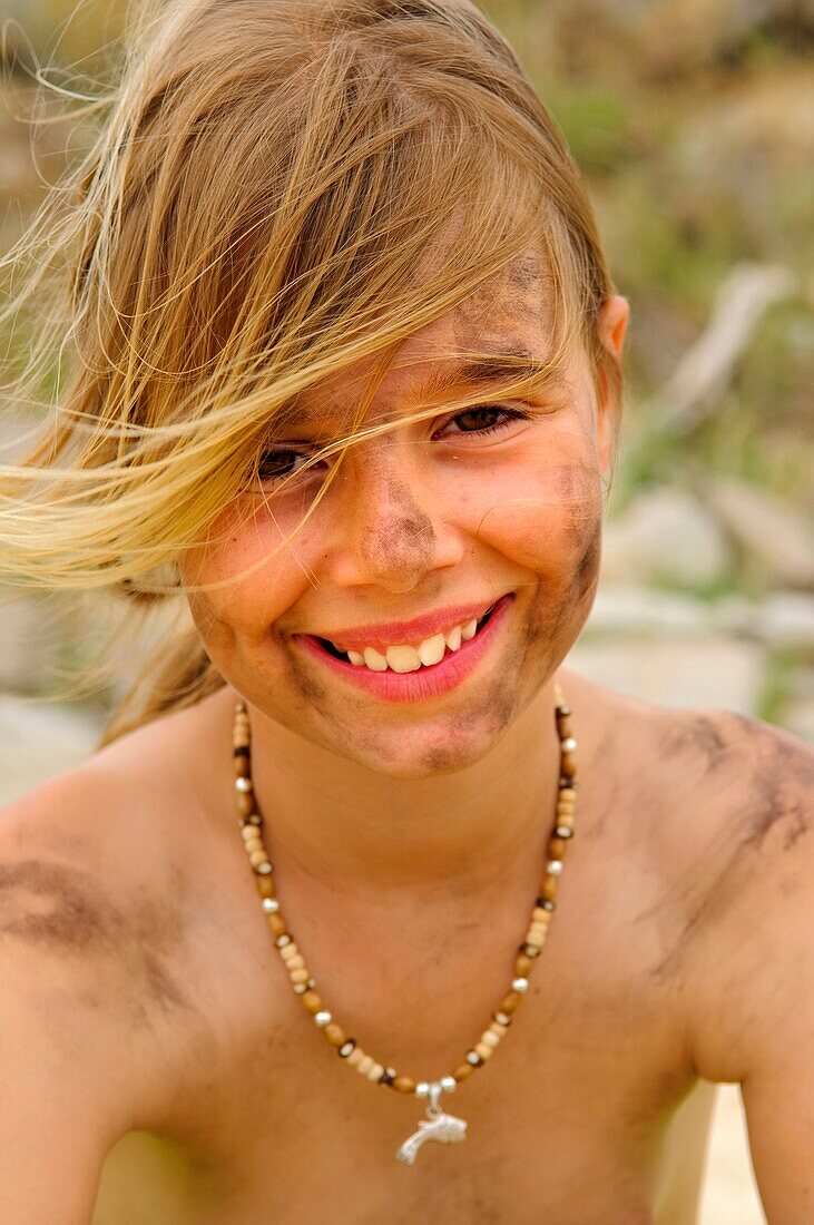 5 to 10 years, 5-10 years, Beach, Child, Dirt, Dirty, Female, Girl, Happy, headshot, headshots, Kids, Mud, Muddy, Number 10, Number 8, Number 9, Number eight, Number nine, Number ten, Old, Outdoors, portrait, portraits, Positive, Skin, Smile, Smiling, Sum