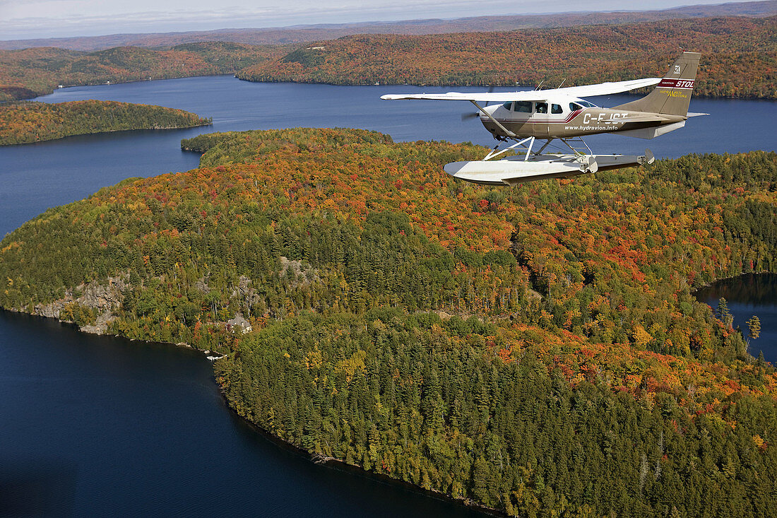 Sacacomie lake and lodge, Mauricie region at fall, Quebec, Canada