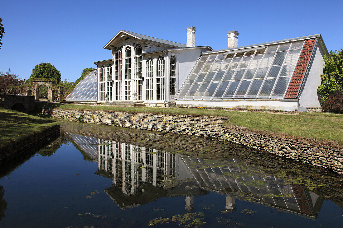 facade of a greenhouse reflecting in lake at Palmse Manor, former Baltic-German Estate, Lahemaa Ntl Park, Estonia, Baltic States, Northeast Europe.