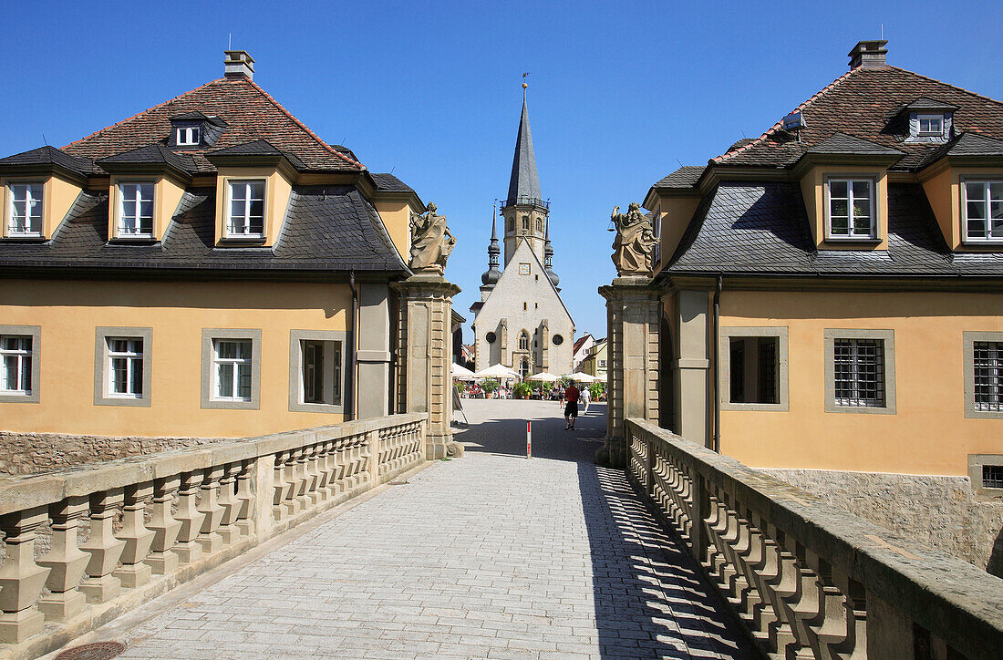 view from the gate of the palais to the Church St  Georg and market square of Weikersheim, Baden-Wuerttemberg, Germany