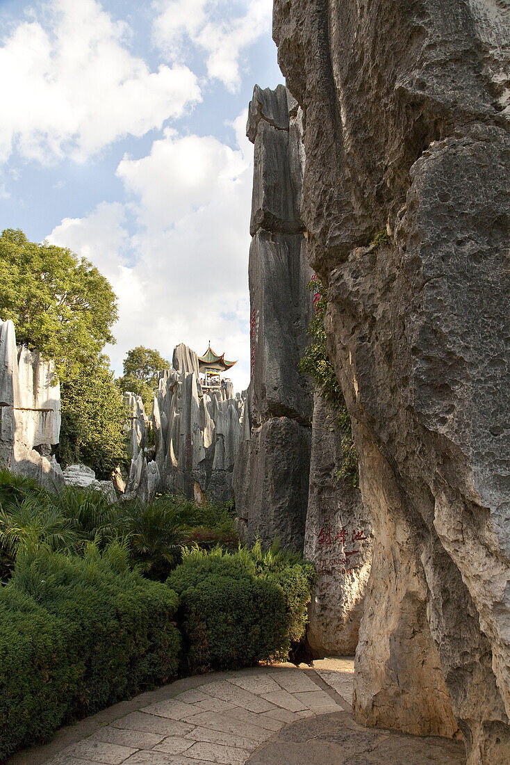 Large stone forest, karst formations under clouded sky, Shilin, Yunnan, People's Republic of China, Asia