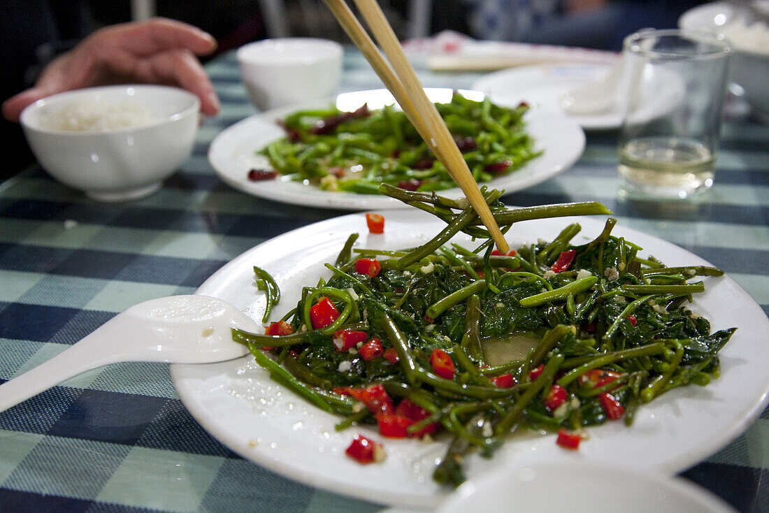 Water spinach, traditional chinese dish in a restaurant at Dali, Yunnan, People's Republic of China, Asia
