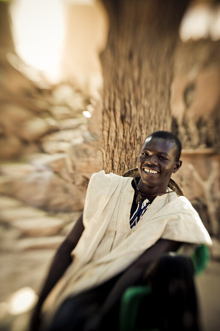 Laughing young man of the Dogon people, Falaise de Bandiagara, Mali, Africa