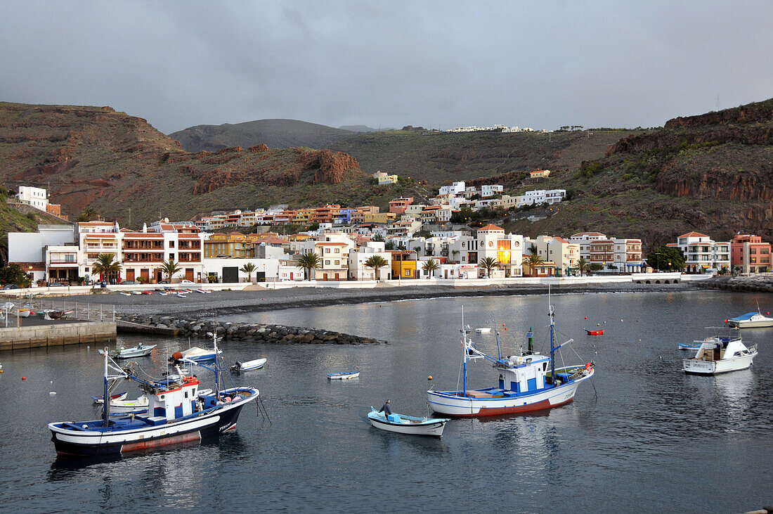 Playa de Santiago, fishing boats off shore at the south coast of Gomera, Canary Isles, Spain, Europe