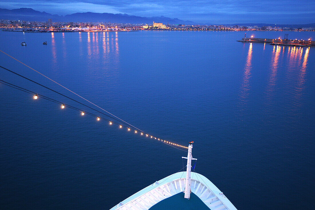 View at the port of Palma de Mallorca and AIDA Bella cruiser in the evening, Mallorca, Spain, Europe