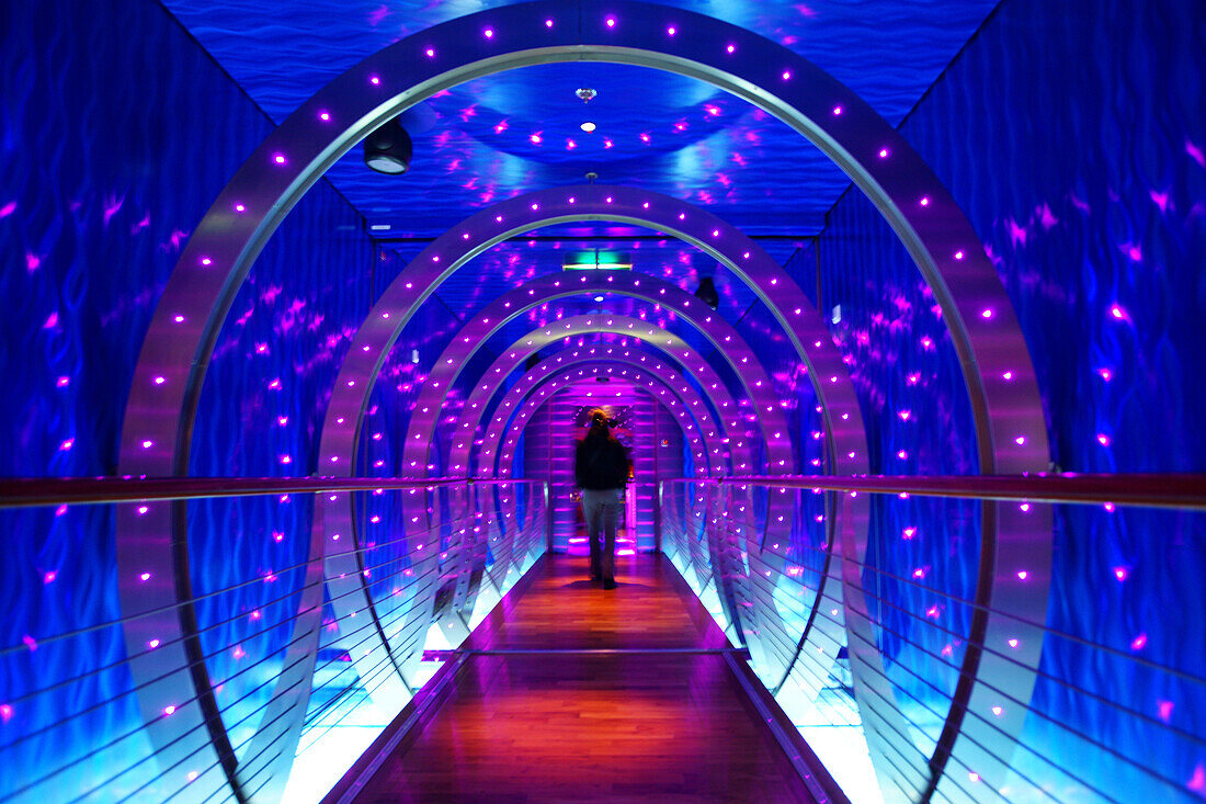 Person at illuminated gangway, AIDA Bella Cruiser