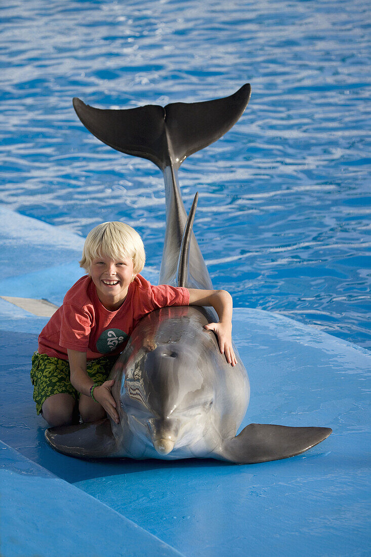 Young boy with a Bottlenose Dolphin