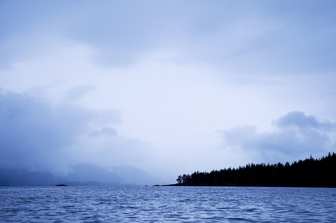 Canada, BC, Queen Charlotte Islands, Gwaii Haanas National Park  Threatening skies over the islands