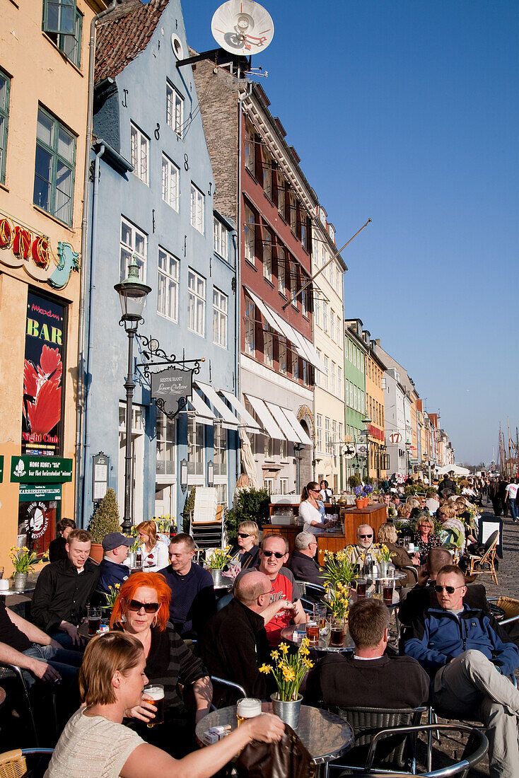 Young people in the Bistro Norden on Amagertorv shopping street, Copenhagen, Denmark