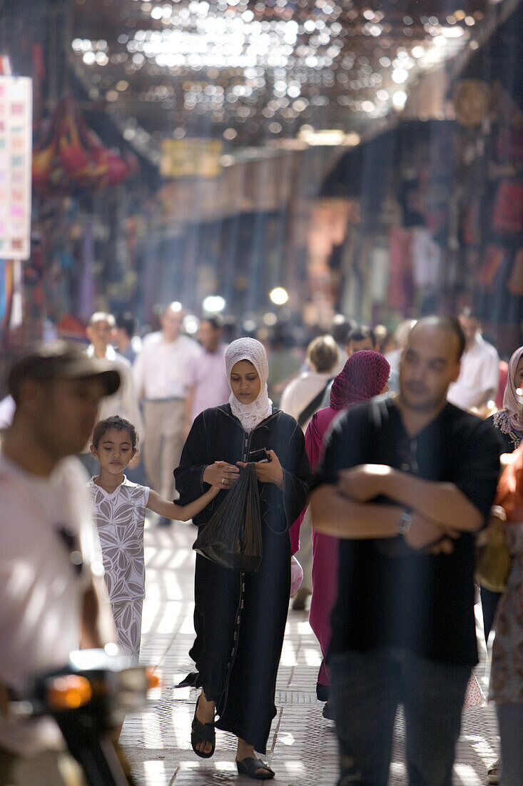 People shopping in the souks, Marrakech, Morocco, Africa