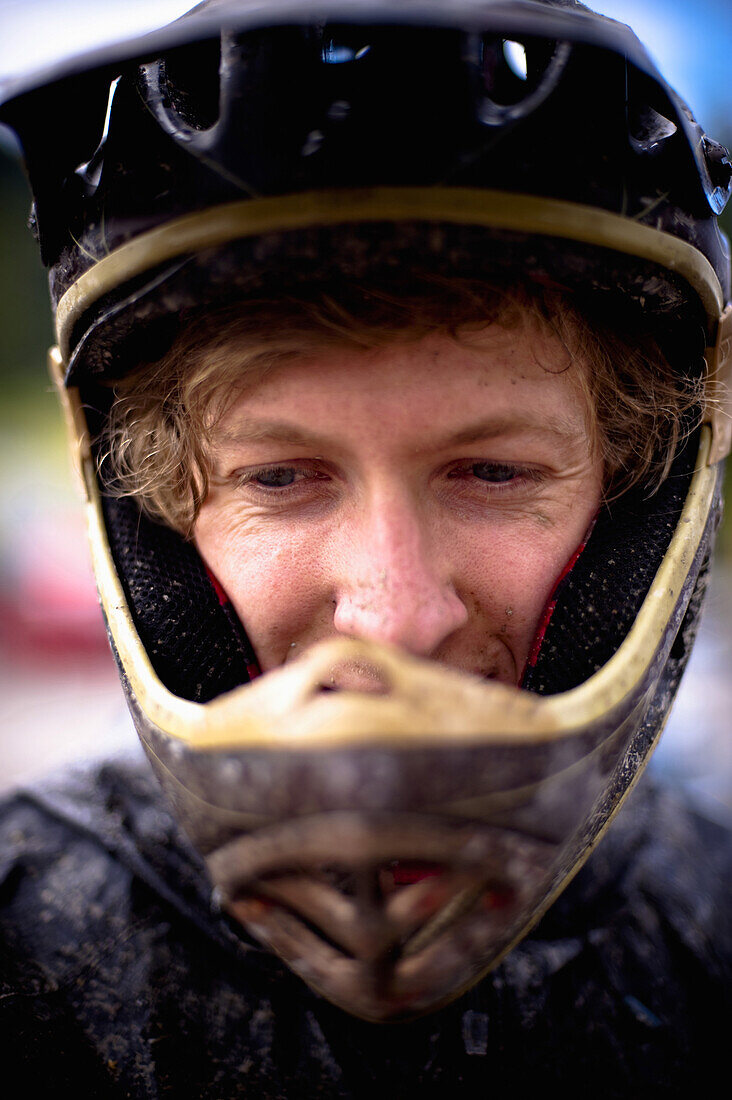 Mountain biker wearing helmet, portrait, Austria