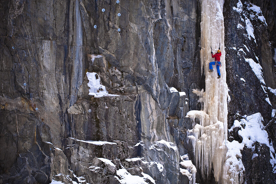 Ice climber on a icefall, Rjukan, Telemark, Norway