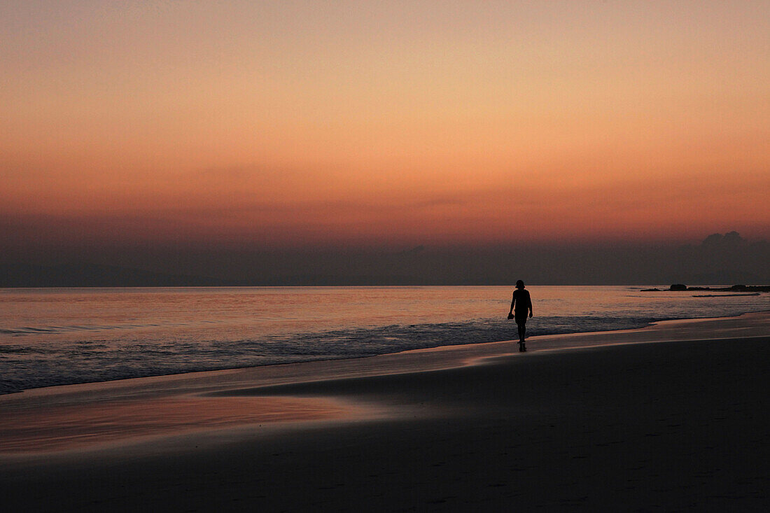 One person on Radha Nagar Beach at sunset, Beach 7, Havelock Island, Andamans, India