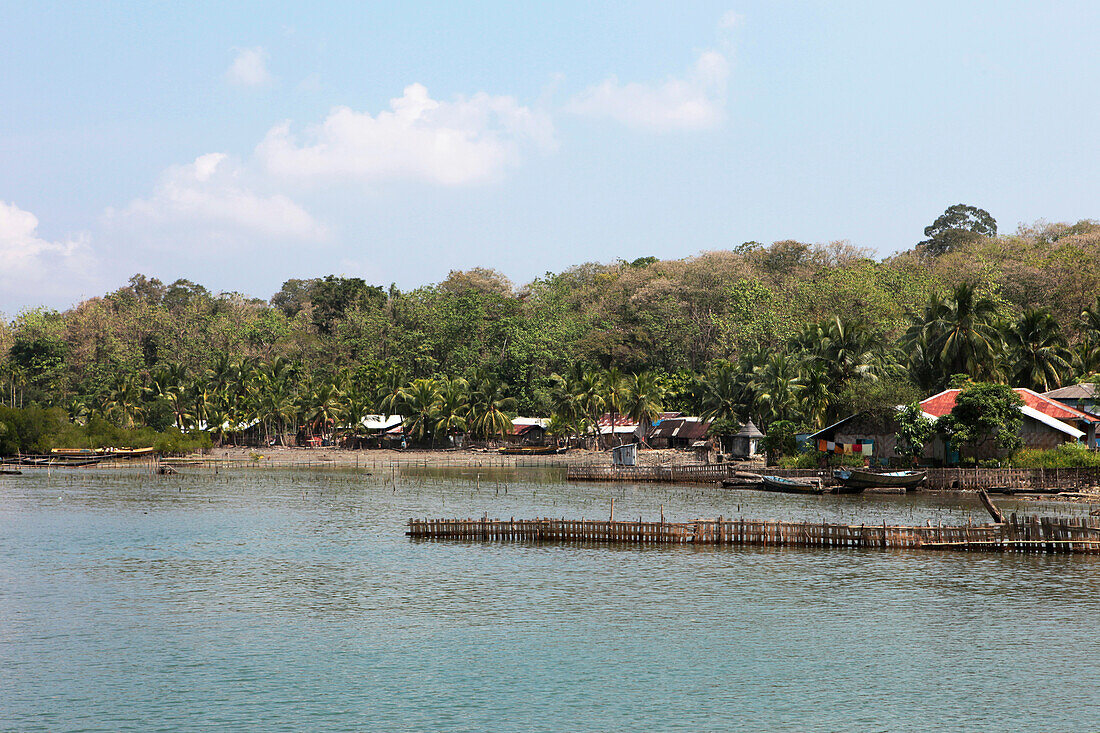 Village on the waterfront in the sunlight, Uttara jetty, Baratang, Middle Andaman, Andamans, India
