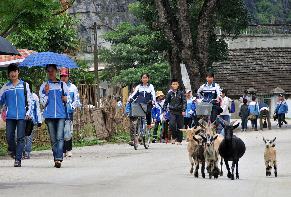 People walking down the streets in Halong bay near Ninh Binh, north Vietnam, Vietnam