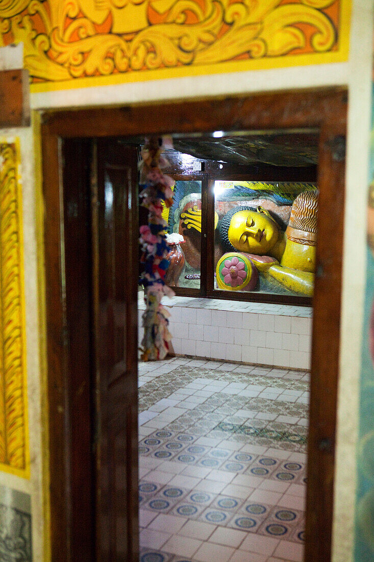 Lying Buddha inside the Dowa Rock Temple, Ella, Highland, Sri Lanka, Asia