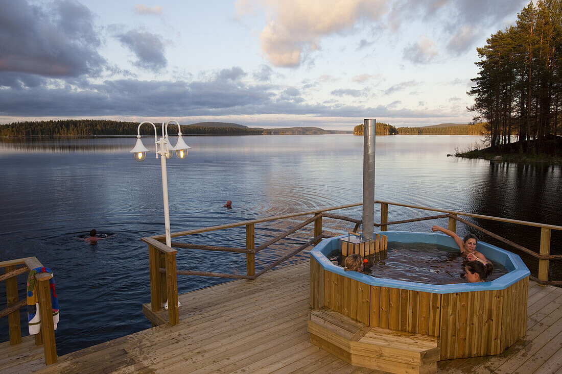 People at eco spa at lake of Trehörningsjö, Vaesternorrland, Sweden, Europe