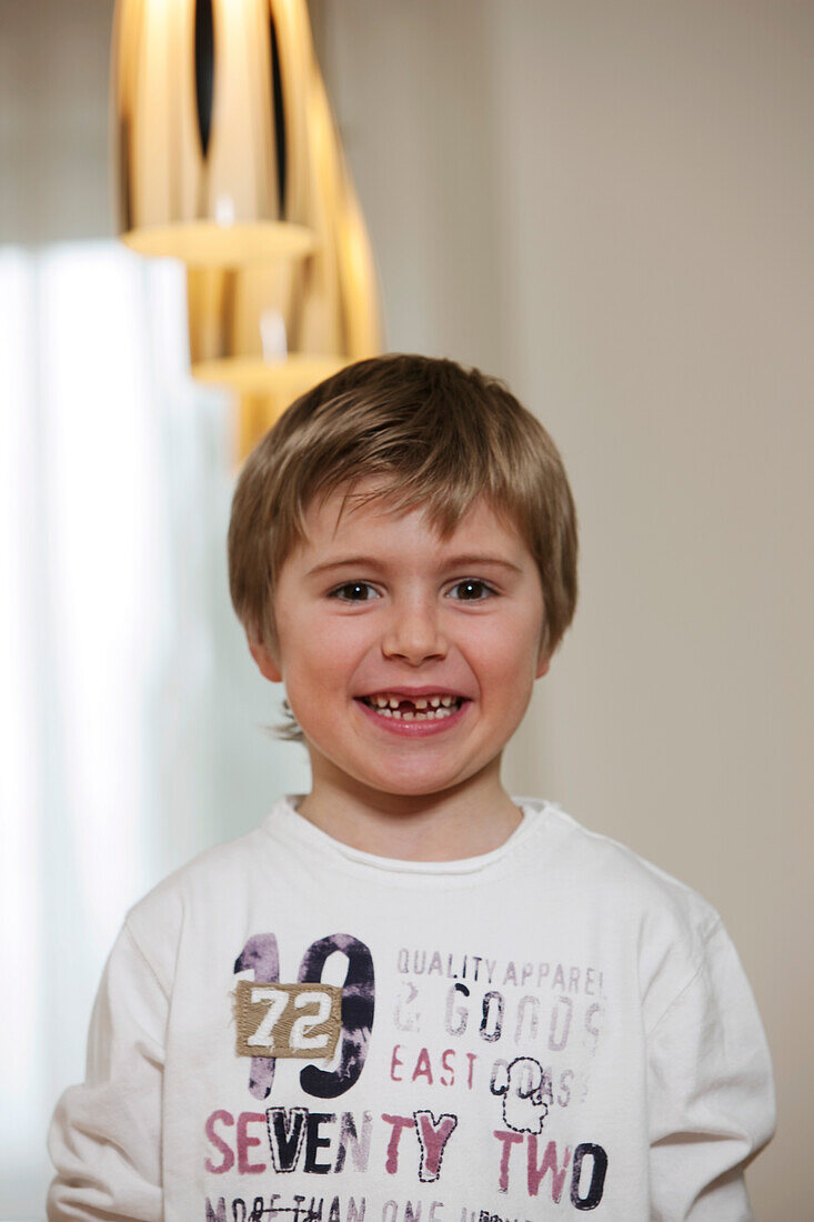 Boy (6 years) smiling at camera