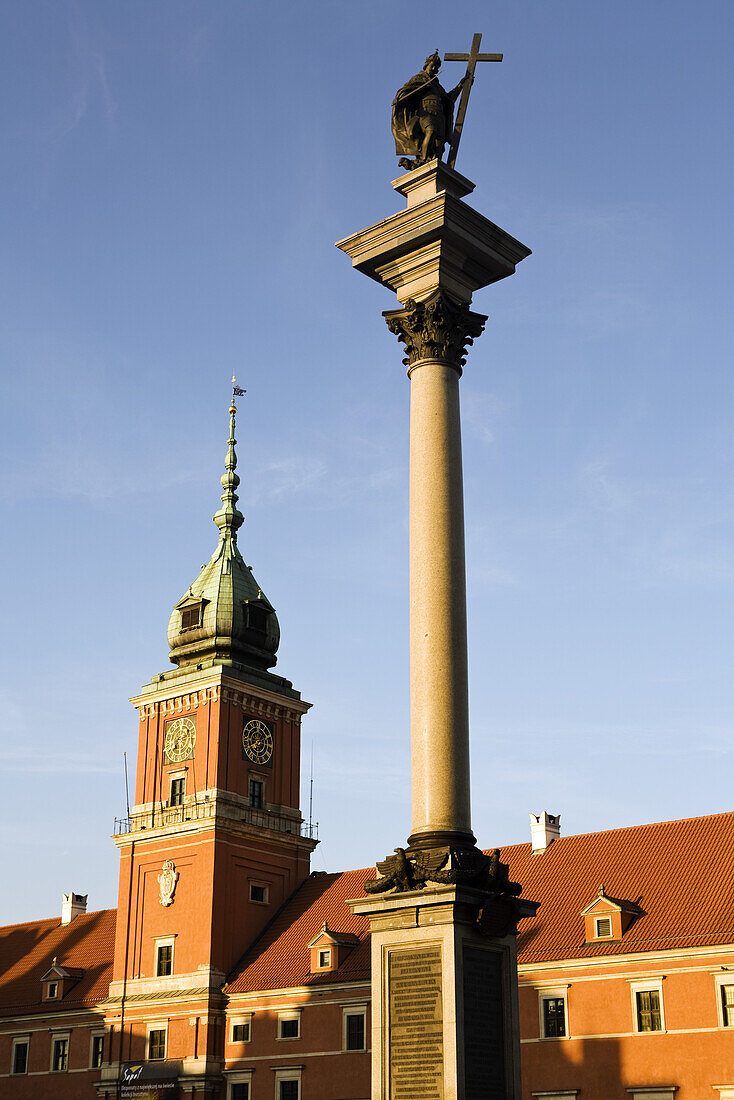 Zygmunt's Column and the Royal Castle at Castle Square, Warsaw, Poland, Europe