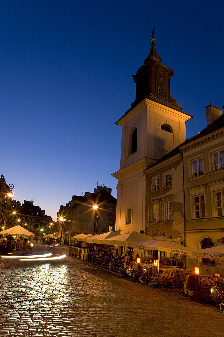 People in street cafes in the old town in the evening, Warsaw, Poland, Europe