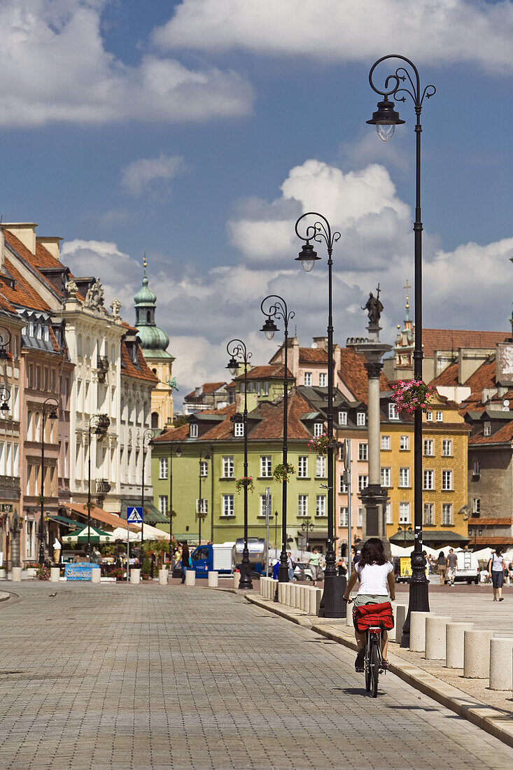 The Krakowskie Przedmiescie Street under clouded sky, Warsaw, Poland, Europe