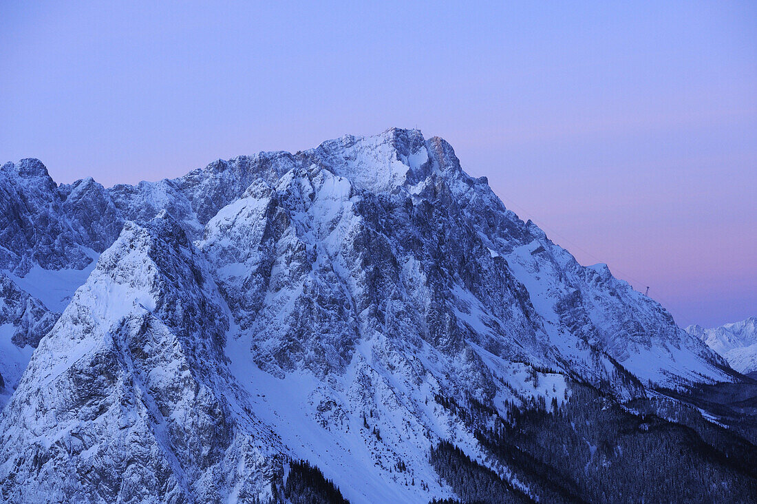 Aerial view of Zugspitze with Jubilaeumsgrat and Waxensteine before sunrise, Garmisch-Partenkirchen, Wetterstein range, Bavarian alps, Upper Bavaria, Bavaria, Germany, Europe