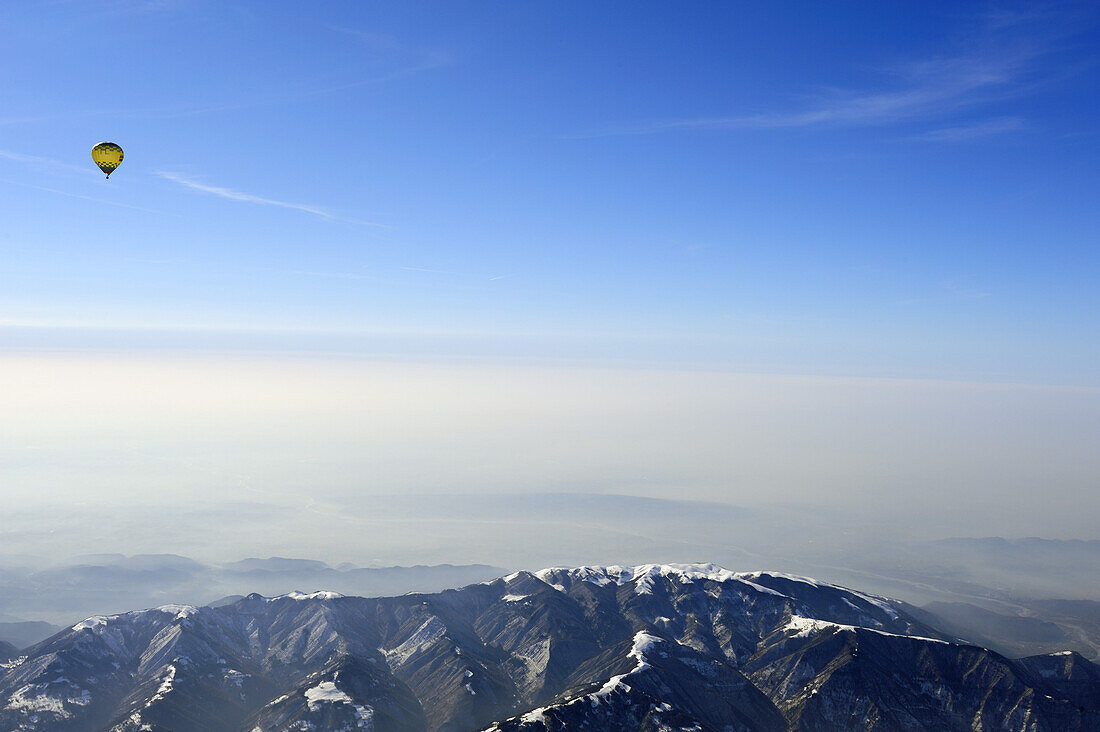 Hot-air balloon flying high above Nevegal range, aerial photo, Belluno, Dolomites, Venetia, Italy, Europe