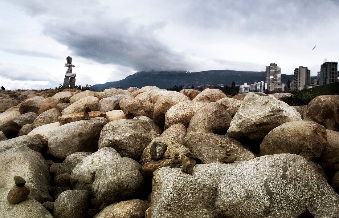 Large rock son beach English Bay Vancouver BC Canada