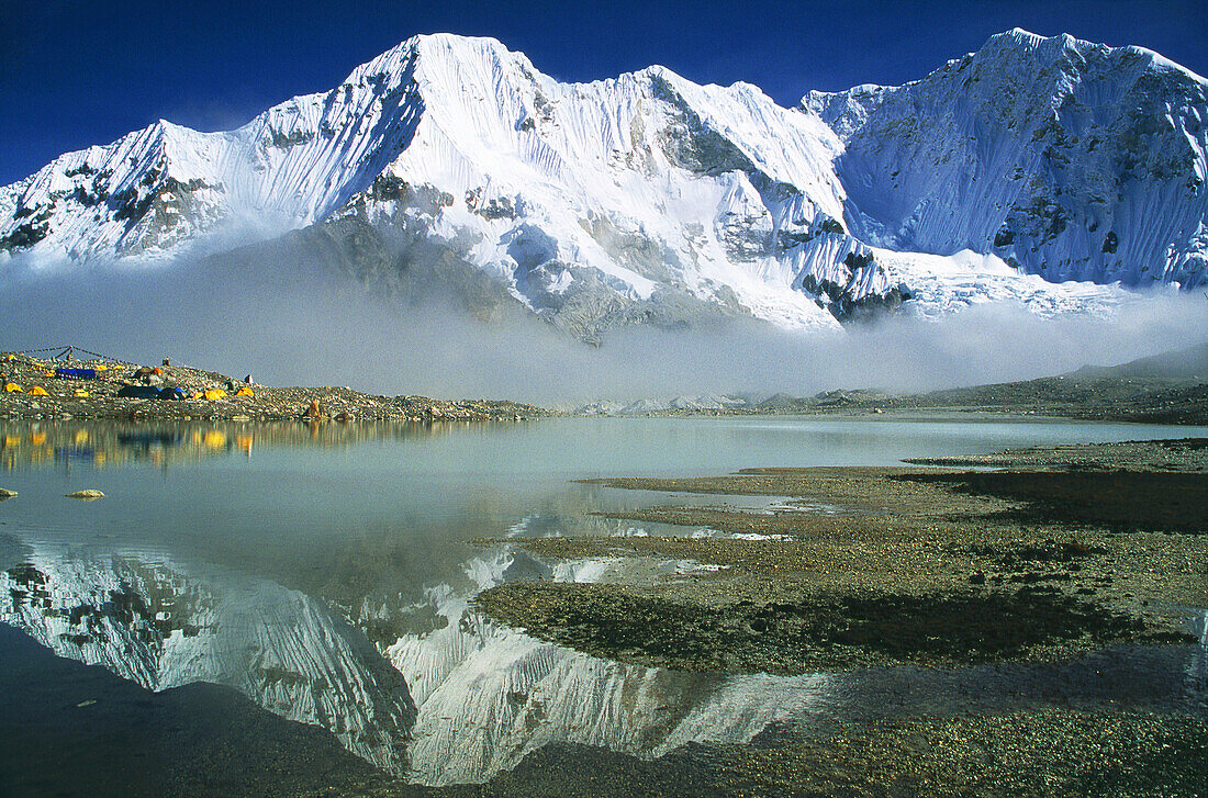 Baruntse base camp reflections in evening light Makalu-Barun National Park Nepal