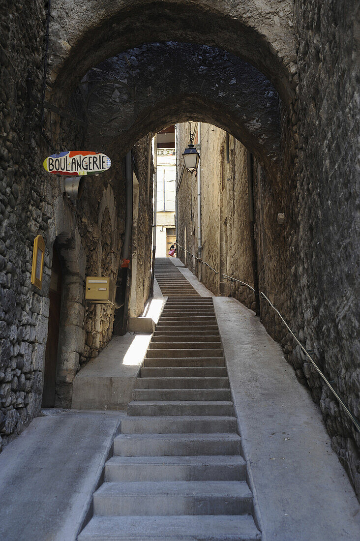Stairs and alley between houses and sign Boulangerie, Sisteron, Haute Provence, France, Europe