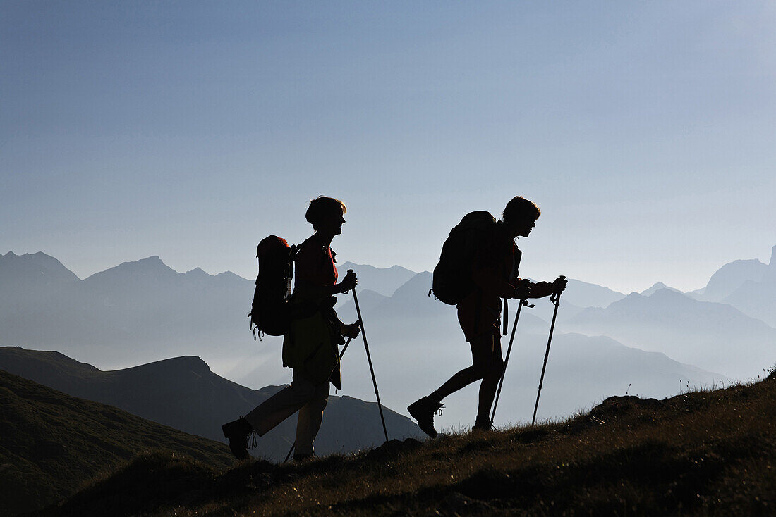 Two women hiking, Stallerberg, between Bivio and Juf, Canton of Grisons, Switzerland