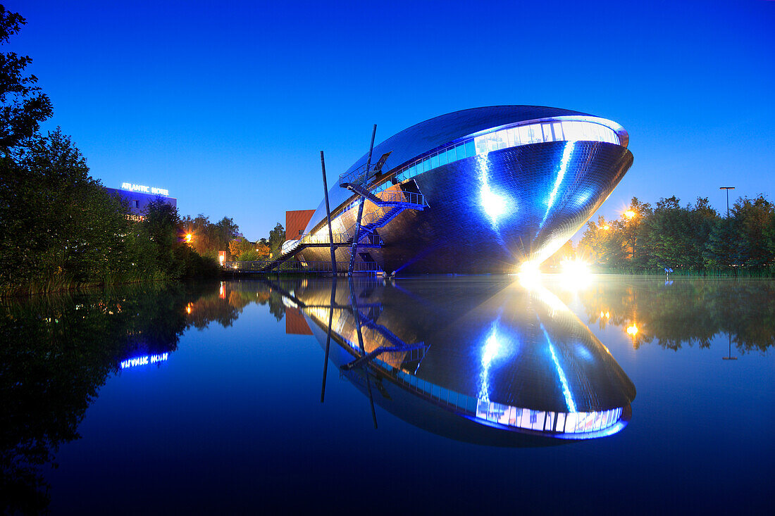 The illuminated science museum Universum in the evening, Hanseatic City of Bremen, Germany, Europe