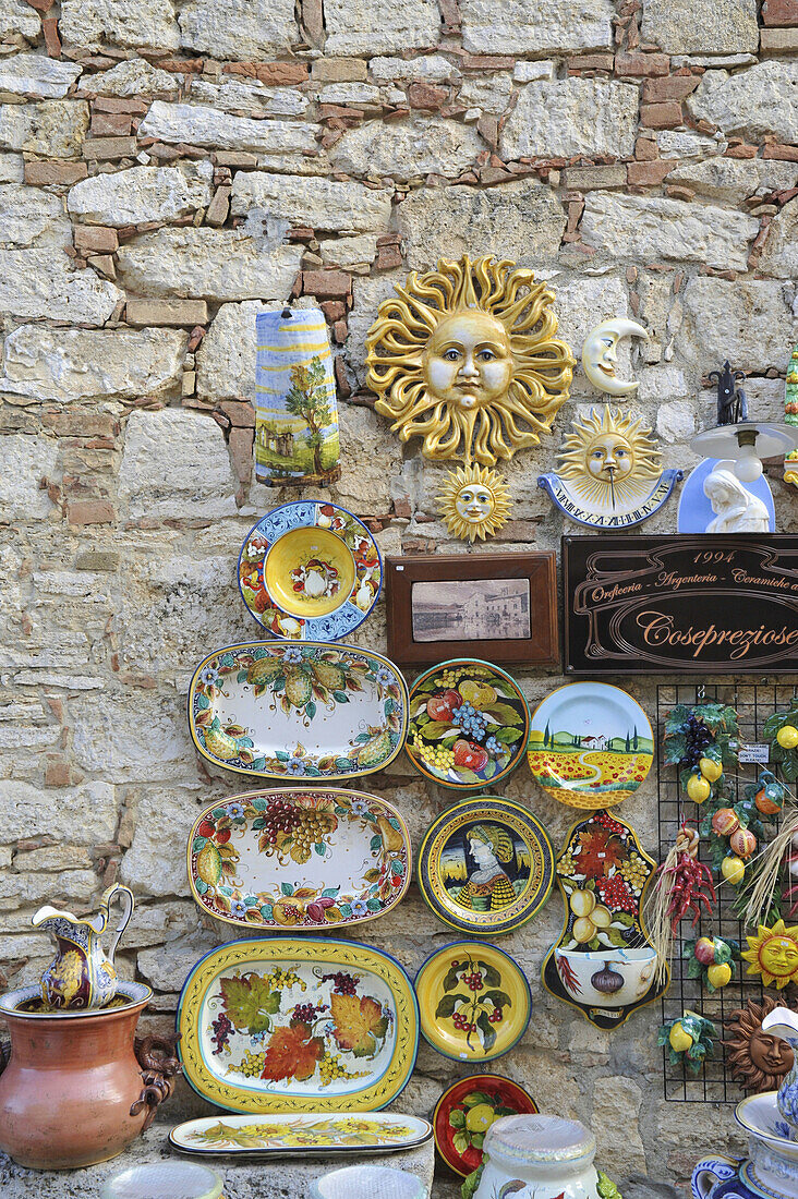 Painted ceramic souvenirs at thermae of Bagno Vignoni, Orcia Valley, Tuscany, Italy, Europe
