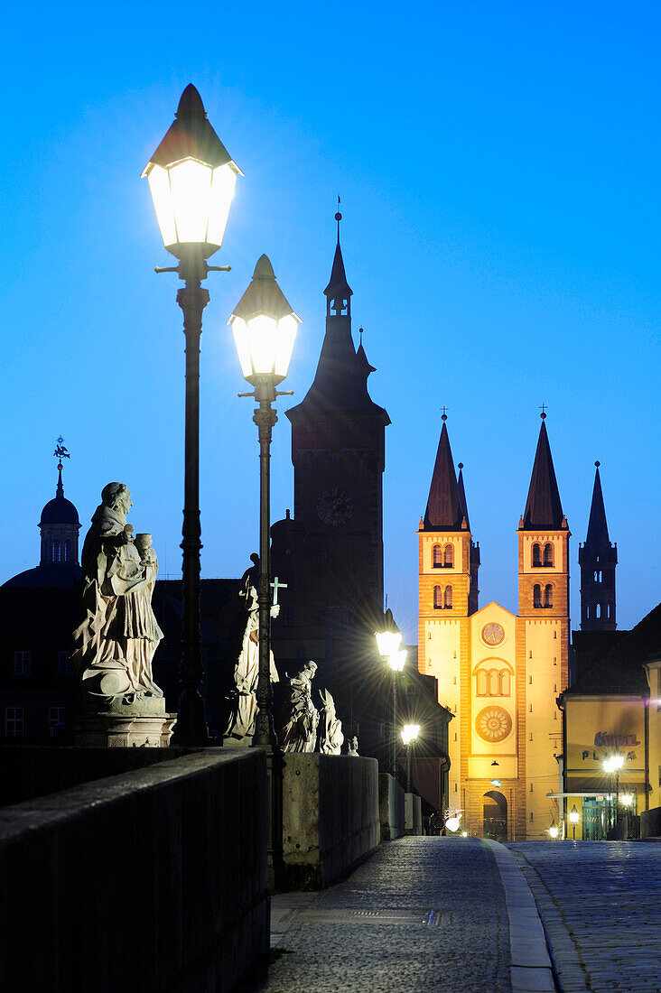 Illuminated bridge Alte Mainbruecke and city of Wuerzburg in the evening light, Wuerzburg, Bavaria, Germany