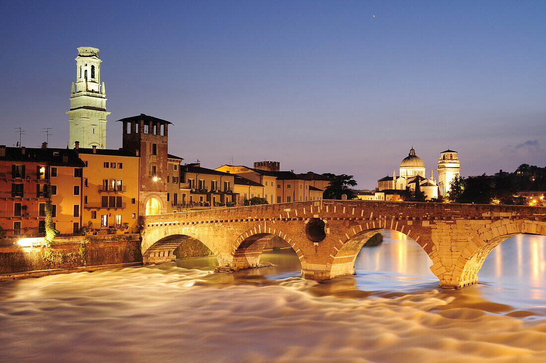 Illuminated bridge Ponte Pietra at night, UNESCO World Heritage Site, Verona, Venetia, Italy