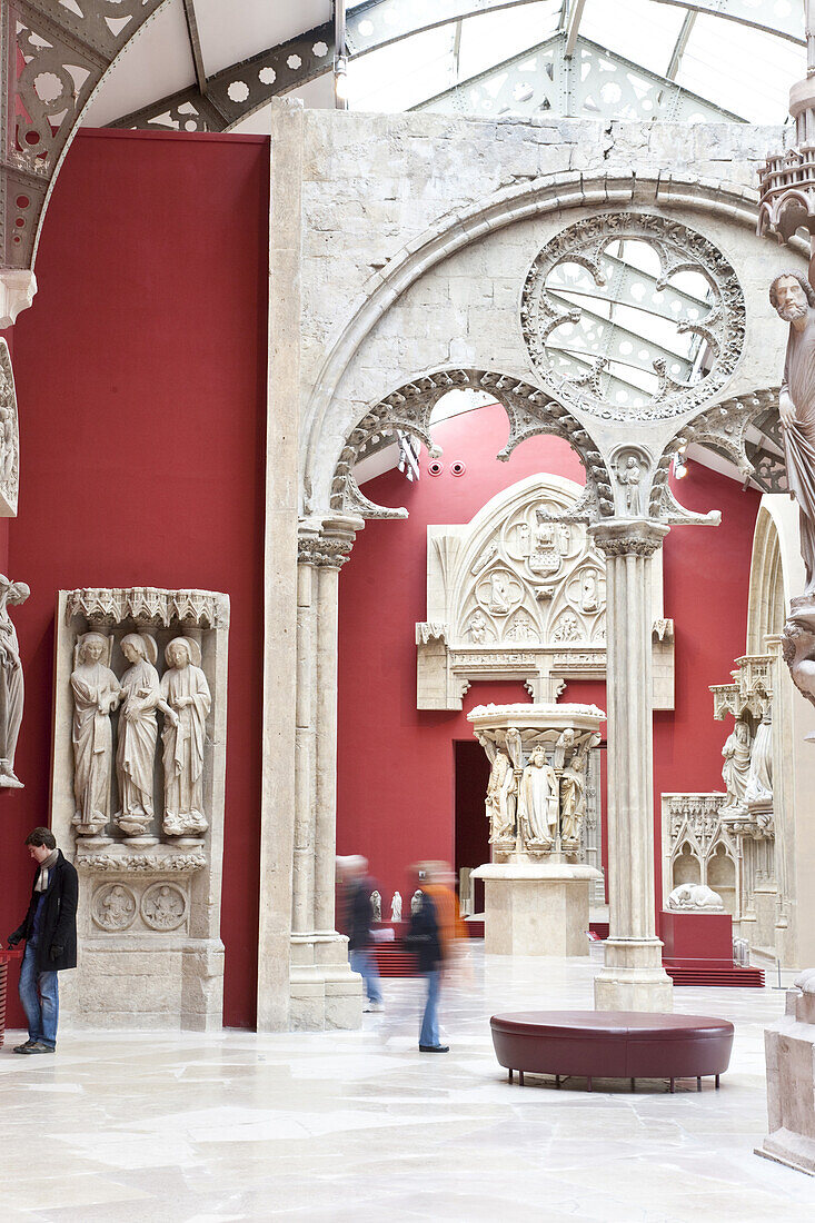 People and sculptures at the museum Cité de l'architecture et du patrimoine, Paris, France, Europe