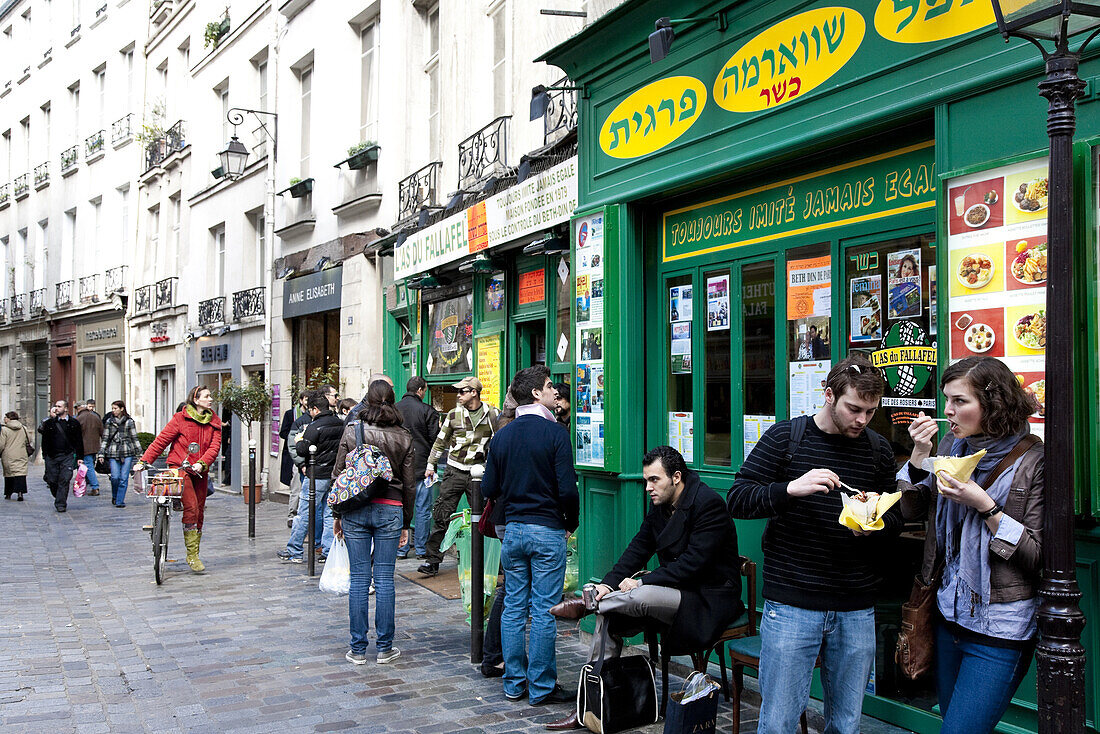 People in front of a snack bar at Jewish District at Marais, Paris, France, Europe