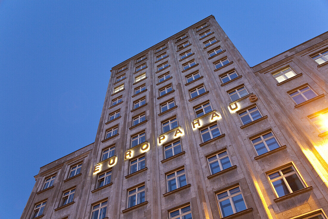 Illuminated Europahaus in the evening, Leipzig, Saxony, Germany