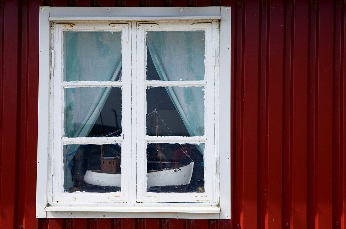 Ship model of a fishing boat standing in a window, Kaseberga, Ystad, Skane, South Sweden, Sweden