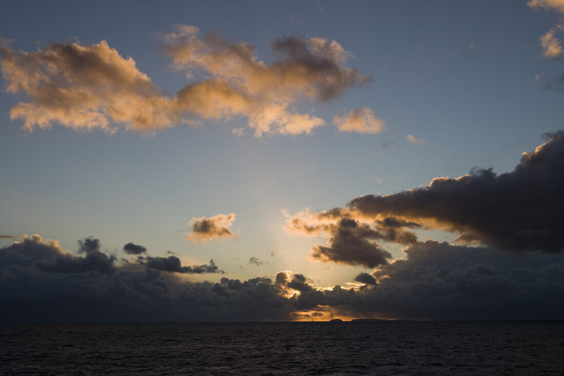 Clouds and coastline at sunrise, Isla Hornos, Magallanes y de la Antartica Chilena, Patagonia, Chile, South America, America