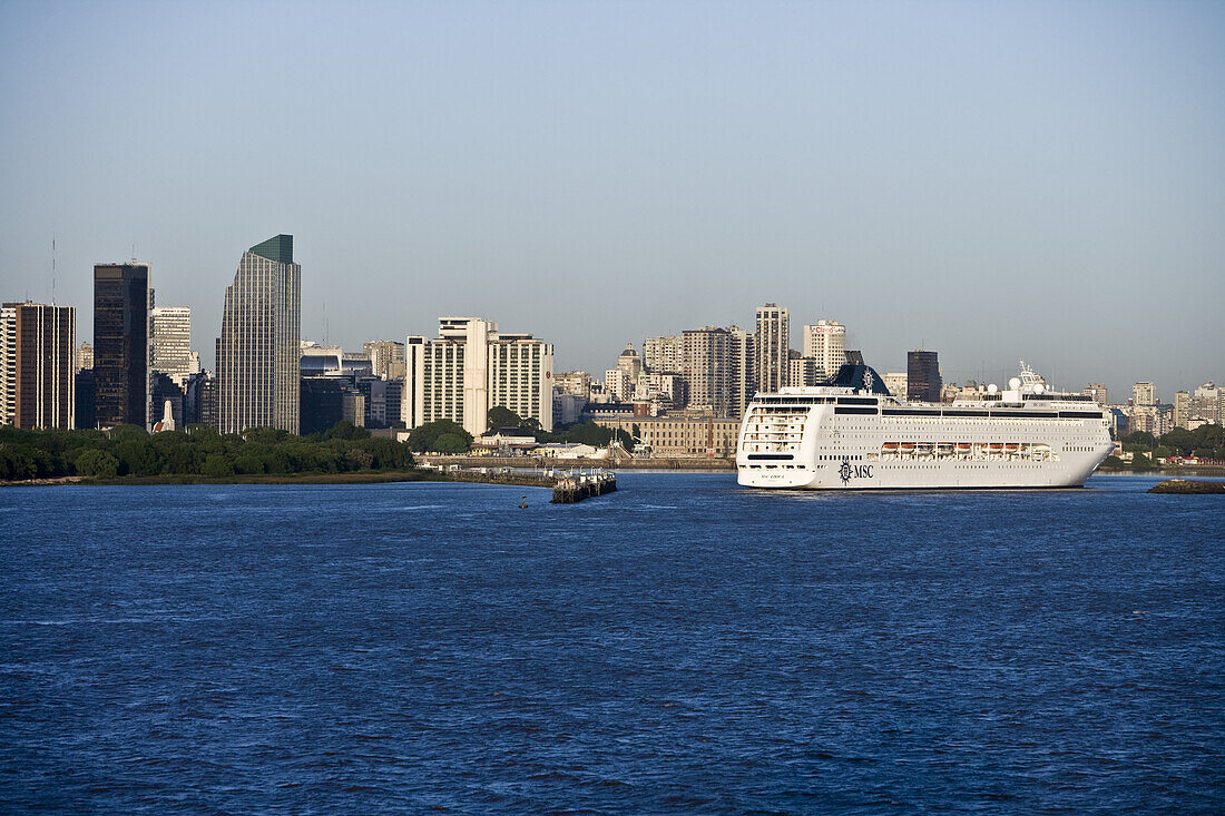 Cruiseship MSC Lirica (MSC Cruises) approaches pier on Rio de la Plata, Buenos Aires, Argentina, South America, America