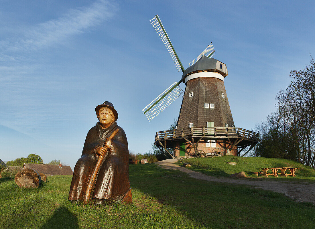 Windmill and sculptur in Roebel, Mecklenburg Lake District, Mecklenburg-Western Pomerania, Germany