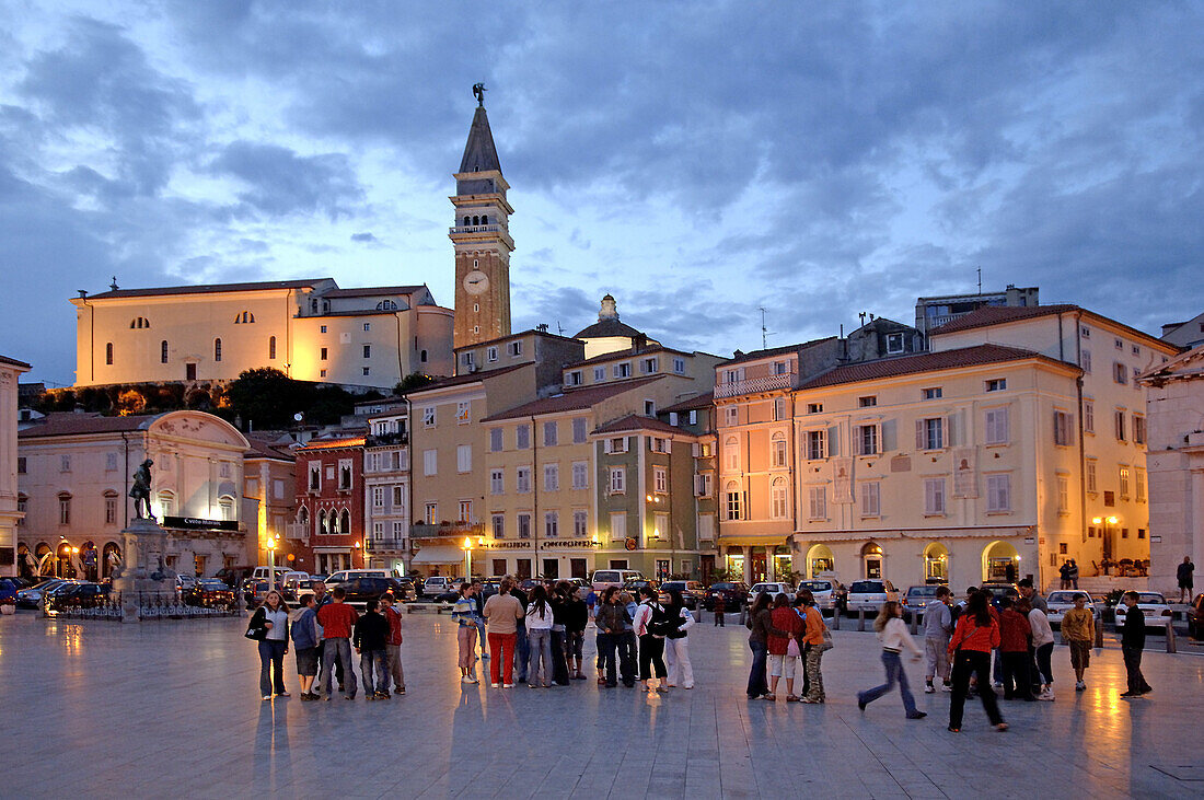 People on a square in the evening, Piran, Slovenia, Europe