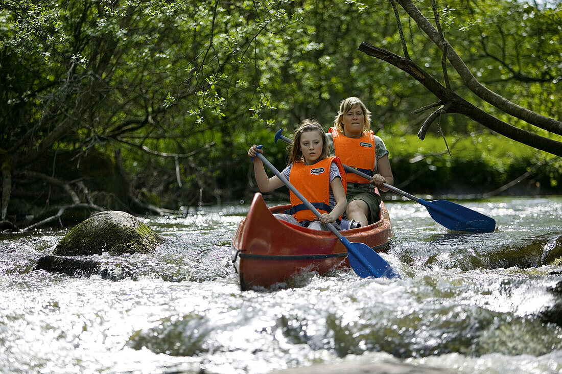 Paddle a canoe, Rönneå, Skåne, Sweden